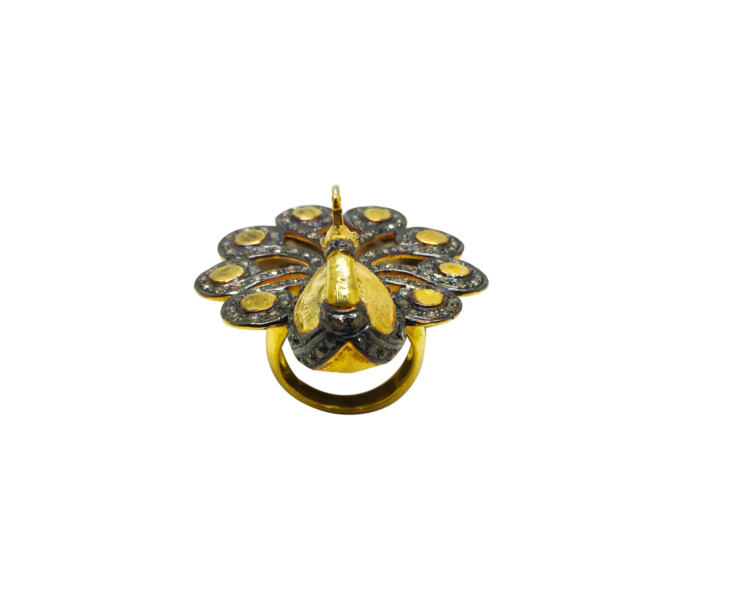 Pavé blossom ring from above: gilded petals set with pavé stones around a gold-toned centre
