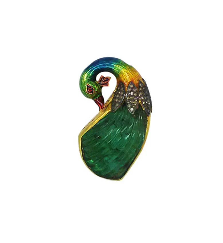 Pendant of a peacock whose body is a large carved green stone, with pavé neck