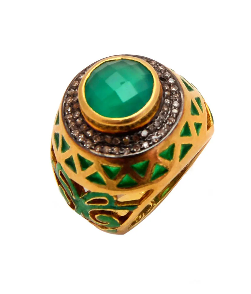 Green cabochon ring from above, showing the stone inside a pavé halo and green enamel lattice dome