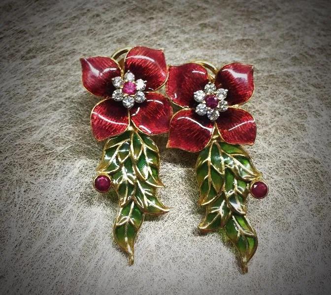 Earrings of crimson enamel flowers with diamond centres and green leaf drops