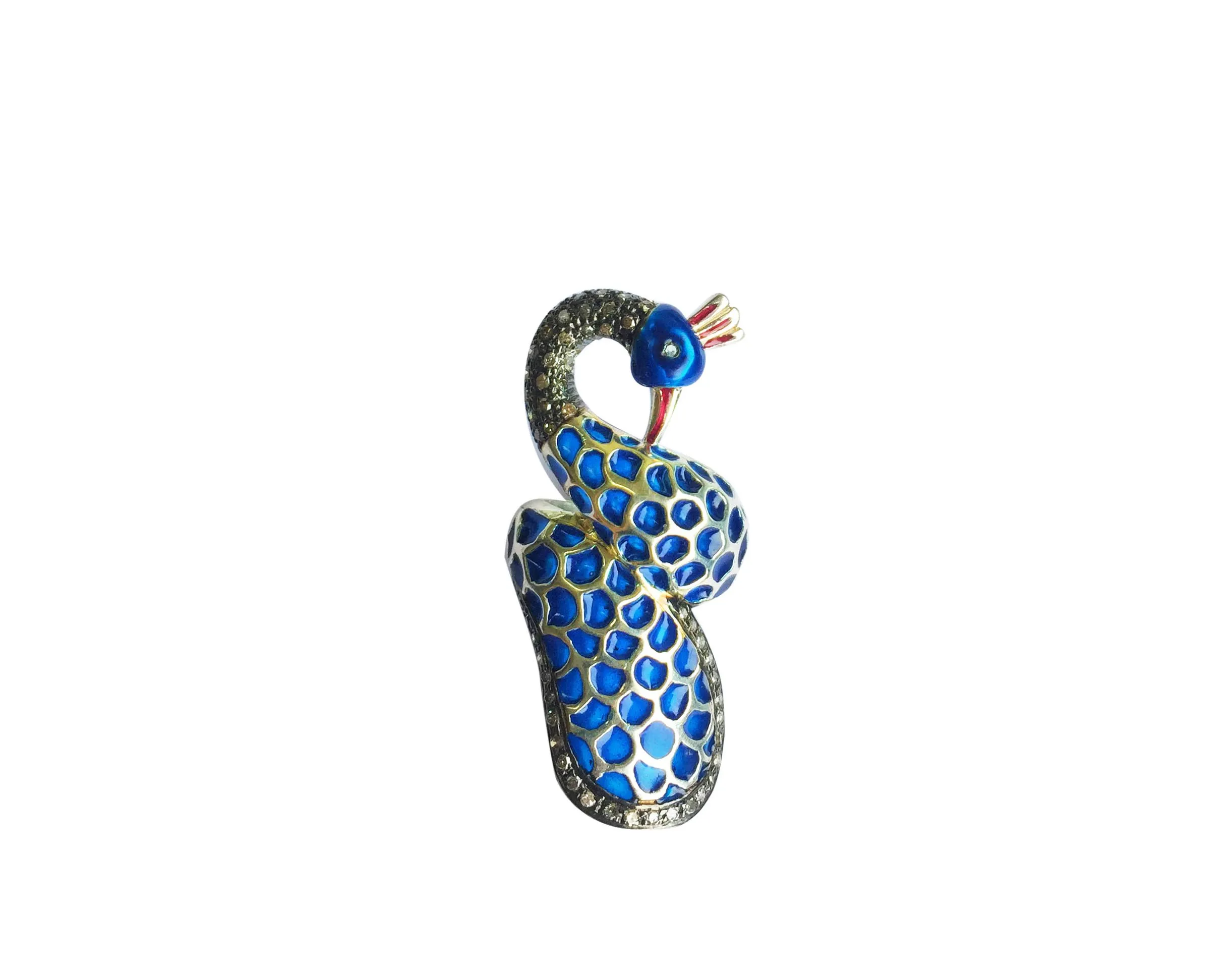 Spotted blue enamel bird ring, upright front view showing the curled bird