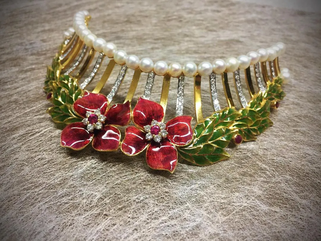Necklace of crimson enamel flowers and green leaves with diamond settings