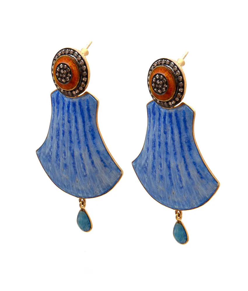 Blue fluted drop earrings seen from the side