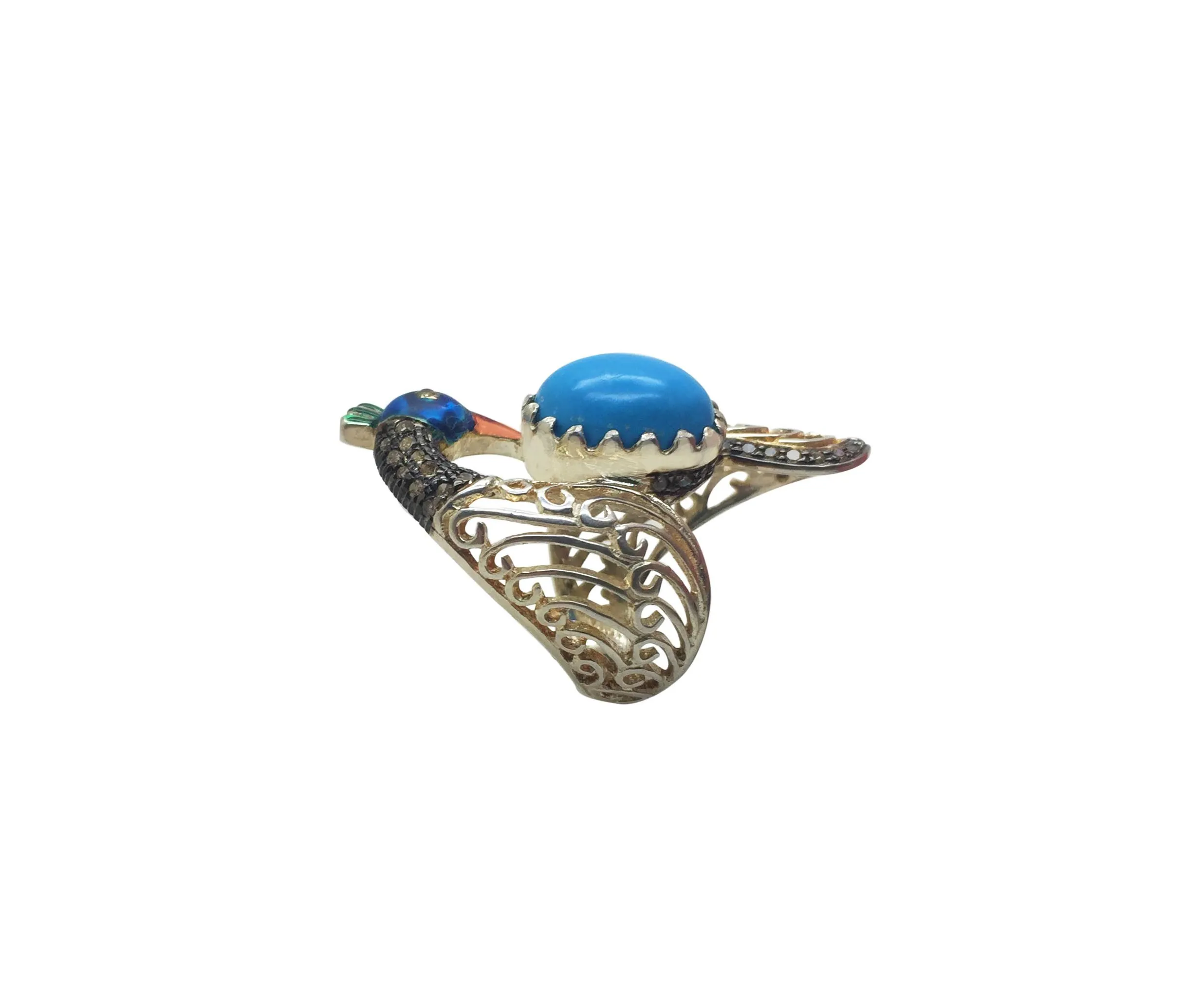 Turquoise peacock ring in three-quarter view showing the filigree band