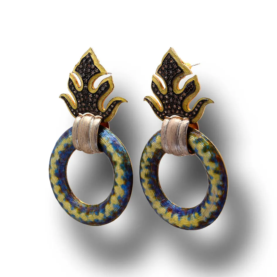 Blue enamel hoop earrings seen from the side