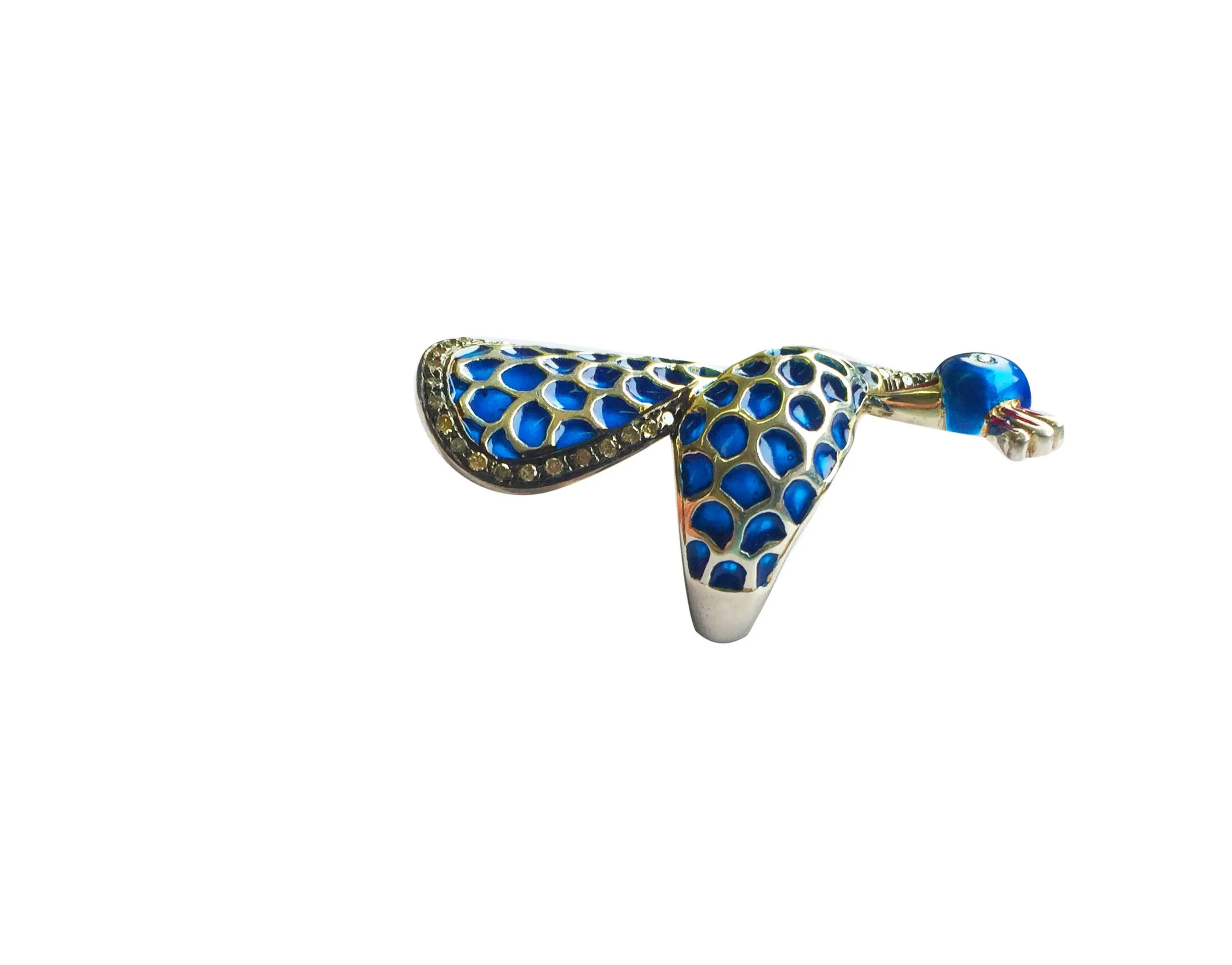 Spotted enamel bird ring laid flat, seen along the band