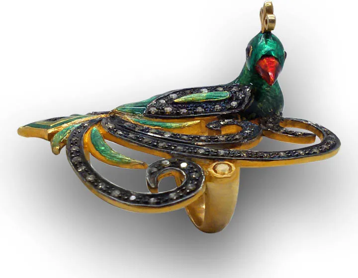 Front view of the grand peacock ring showing the bird’s head and crest